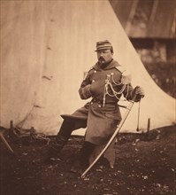 French Provost Marshal of the Division of General Bosquet, Full-Length Seated Portrait Wearing Uniform with One Hand Placed inside his Coat, Crimean War, Crimea, Ukraine, by Roger Fenton, 1855