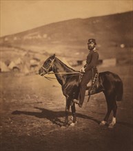 British Captain Henry John Wilkinson, 9th (East Norfolk) Regiment of Foot, Full-Length Portrait Sitting on Horse, Crimean War, Crimea, Ukraine, by Roger Fenton, 1855