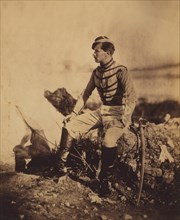 Captain Thomas, aide-de-camp to General Pierre Bosquet, Seated Full-Length Portrait in Uniform with Sword, Crimean War, Crimea, Ukraine, by Roger Fenton, 1855