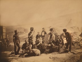 British Soldiers of the 8th Hussars Standing and Sitting around Cooking Pots as Cook Ladles Food into Bowl, Crimean War, Crimea, Ukraine, by Roger Fenton, 1855