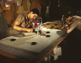 Two Workers Precisely Cutting and Drilling Parachute Packs during WWII, Pioneer Parachute Company Mills, Manchester, Connecticut, USA, William M. Rittase for Office of War Information, August 1942