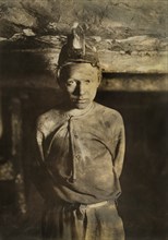 Trapper Boy, Turkey Knob Mine, Half-Length Portrait Taken more than 1 mile inside Mine, MacDonald, West Virginia, USA, Lewis Hine for National Child Labor Committee, October 1908