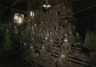 Large Group of Breaker Boys inside Ewen Breaker, Noon Break, South Pittston, Pennsylvania, USA, Lewis Hine for National Child Labor Committee, January 1911