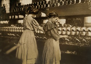 Two Young Girls at Spoolers, Lincoln Cotton Mills, Evansville, Indiana, USA, Lewis Hine for National Child Labor Committee, October 1908