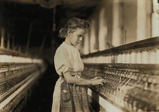 Young Girl Working in Textile Mill, Cherryville, North Carolina, USA, Lewis Hine for National Child Labor Committee, November 1908