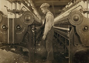 Young Doffer Boy in Cotton Mill, Lincolnton, North Carolina, USA, Lewis Hine for National Child Labor Committee, November 1908