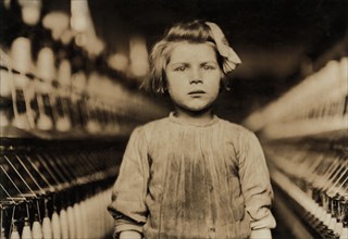 Young Girl Working as Spinner in Globe Cotton Mill, Head and Shoulders Portrait, Augusta, Georgia, USA, Lewis Hine for National Child Labor Committee, January 1909