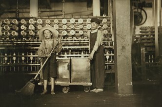 Ronald Webb, 12-year-old Doffer Boy, Frank Robinson, 7-year-old Sweeper, Full-Length Portrait in Cotton Mills, Roanoke Virginia, USA, Lewis Hine for National Child Labor Committee, May 1911