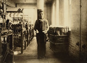 Dosaliv Loselle, Young Band Boy at Textile Mill, Full-Length Portrait, Chicopee, Massachusetts, USA, Lewis Hine for National Child Labor Committee, November 1911