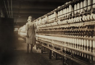 Young Spinner, Full-Length Portrait, Spinning Room #7, Chicopee, Massachusetts, USA, Lewis Hine for National Child Labor Committee, November 1911