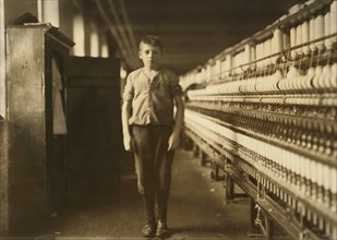 Dosilav Loselle, Full-Length Portrait, Works as Band Boy at Textile Mill, Chicopee, Massachusetts, USA, Lewis Hine for National Child Labor Committee, November 1911