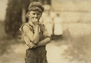 Young Worker, Appears to be 11 years old, Half-Length Portrait, Nokomis Cotton Mill, Lexington, North Carolina, USA, Lewis Hine for National Child Labor Committee, October 1912