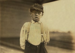 Herman Parker, 6 years old, Half-Length Portrait, Underage Worker at Cannon Mills, Kannapolis, North Carolina, USA, Lewis Hine for National Child Labor Committee, October 1912