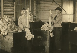 Two Young Turners at Work in Crescent Hosiery Mill, Scotland Neck, North Carolina, USA, Lewis Hine for National Child Labor Committee, November 1914