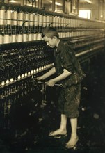 Cleaner and Sweeper, Full-Length Portrait, Spinning Department, American Linen Company, Fall River, Massachusetts, USA, Lewis Hine for National Child Labor Committee, June 1916