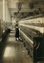 Hannah Mills, 15 years old, Young Spinner in Textile Mill, King Philip Mills, Fall River, Massachusetts, USA, Lewis Hine for National Child Labor Committee, June 1916