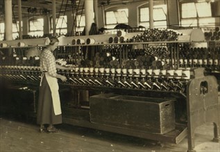 Spooler Tender, 15 years old, Berkshire Cotton Mills, Adams, Massachusetts, USA, Lewis Hine for National Child Labor Committee, July 1916