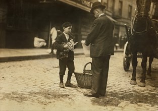 Young Vendor Selling Vegetables, Boston Market, Boston, Massachusetts, USA, Lewis Hine for National Child Labor Committee, October 1909