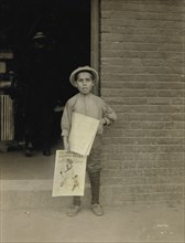 Young Newsie, Portrait Standing and Holding Newspapers, Burlington, Vermont, USA, Lewis Hine for National Child Labor Committee, September 1910