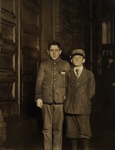 Samuel Weinstein and William Locke, Two Night Messengers, Portrait Standing, Falls River, Massachusetts, USA, Lewis Hine for National Child Labor Committee, November 1910