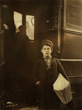 Donato Dandrea, 14 years old, Sells Newspapers days and evenings, does not go to school, Buffalo, New York, USA, Lewis Hine for National Child Labor Committee, February 1910