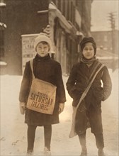 Two Newsboys, Portrait Standing in Snow, Utica, New York, USA, Lewis Hine for National Child Labor Committee, February 1910