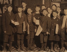 Group of Young Newsboys and Vendors Selling Newspapers at 9:00 p.m., St. Louis, Missouri, USA, Lewis Hine for National Child Labor Committee, May 1910