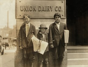 Three Truant Newsboys, Full-Length Portrait, St. Louis, Missouri, USA, Lewis Hine for National Child Labor Committee, May 1910
