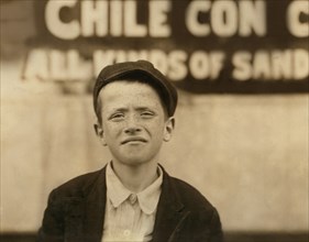 Johnnie Burns, 9-year-old Newsie, Head and Shoulders Portrait, St. Louis, Missouri, USA, Lewis Hine for National Child Labor Committee, May 1910