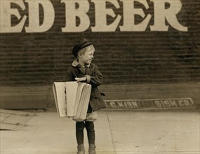 Francis Lance, 5-year-old Newsboy, Full-length Portrait on Sidewalk, Grand Avenue, St. Louis, Missouri, USA, Lewis Hine for National Child Labor Committee, May 1910