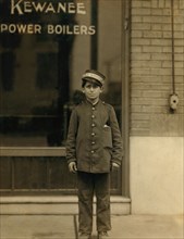 Small Messenger Boy, Portrait Standing on Sidewalk, St. Louis, Missouri, USA, Lewis Hine for National Child Labor Committee, May 1910