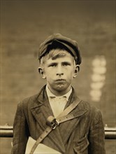 Barney Goldstein, 10-year-old Newsboy, Works 5 hours per day and Visits Saloons, Half-Length Portrait, Wilmington, Delaware, USA, Lewis Hine for National Child Labor Committee, May 1910