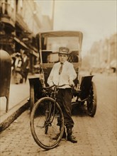 Harvey Buchanan, 14 years, Postal Telegraph Company Messenger, Full-Length Portrait with Bicycle, Wilmington, Delaware, USA, Lewis Hine for National Child Labor Committee, May 1910