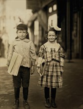 Donald Mallick (left), Myrtle Mallick, 8 years, Full-Length Portrait Selling Newspapers, Wilmington, Delaware, USA, Lewis Hine for National Child Labor Committee, May 1910
