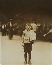 Joseph Blata, 7 years old, Full-Length Portrait, Union Square Newsie, New York City, New York, USA, Lewis Hine for National Child Labor Committee, July 1910