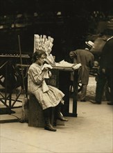 Minnie Paster, 10 years, Tending Newsstand, Bowery and Bond Street, New York City, New York, USA, Lewis Hine for National Child Labor Committee, July 1910