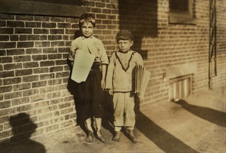 Bobbie & James, Two Young Newsboys, Full-Length Portrait, Northampton, Massachusetts, USA, Lewis Hine for National Child Labor Committee, August 1912