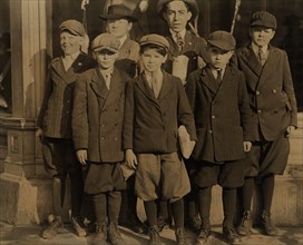 Group of Young Boys, Mostly under 12 years old, Working at Furchgott's Department Store, Full-Length Portrait, Jacksonville, Florida, USA, Lewis Hine for National Child Labor Committee, March 1913