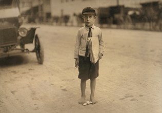 Young Newsie, 8 years old, Full-Length Portrait, Sells Newspapers before going to School, Waco, Texas, USA, Lewis Hine for National Child Labor Committee, September 1913