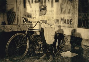 Marion Davis, 14 years old, #21 Messenger for Bellevue Messenger Service, Full-Length Portrait with Bicycle, Houston, Texas, USA, Lewis Hine for National Child Labor Committee, October 1913