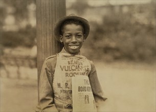 Roland, 11-year-old Newsboy, Half-Length Portrait, Newark, New Jersey, USA, Lewis Hine for National Child Labor Committee, August 1924