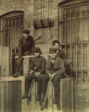 Four Stock Boys and Hustlers, Full-Length Portrait, Dey Brothers & Company Department Store, Syracuse, New York, USA, Lewis Hine for National Child Labor Committee, February 1910