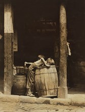 Two Young Brothers Picking Discarded Fruit out of Barrels near 14th Street, New York City, New York, USA, Lewis Hine for National Child Labor Committee, July 1910