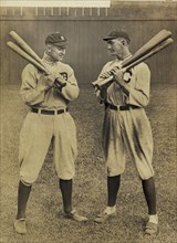 Ty Cobb, Detroit, and Joe Jackson, Cleveland, standing alongside each other, each holding bats, by L. Van Oeyen, 1913