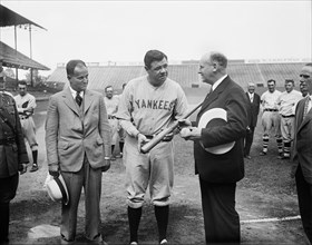 Babe Ruth of the New York Yankees Signing Baseball Bat before Game, Griffith Stadium, Washington DC, USA, Harris & Ewing, 1928