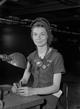Eunice Hancock, 21 years old, Operates Compressed Air Grinder at Midwest Aircraft Motor Plant, Ann Rosener, Office of War Information, August 1942