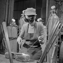 Young Woman Learning to Weld, Six Nights per Week, at Work Projects Administration (WPA) Vocational School in Preparation to Work on Assembly Line in a War Plant, Washington DC, USA, Howard Liberman f...