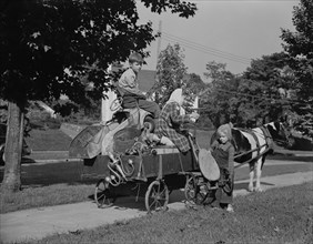Three Children Gathering Scrap Metal with Pony Cart during Scrap Salvage Campaign, Roanoke, Virginia, USA, Valentino Sarra for Office of War Information, October 1942