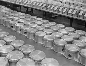 Airplane Engine Pistons, Complete with Rings, are Lined up for Assembly at Manufacturing Plant, Pratt & Whitney, East Hartford, Connecticut, USA, Andreas Feininger for Office of War Information, June ...
