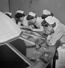 Nursing Students Viewing Surgery Through Binoculars Attached to Dome, Fritz Henle for Office of War Information, November 1942